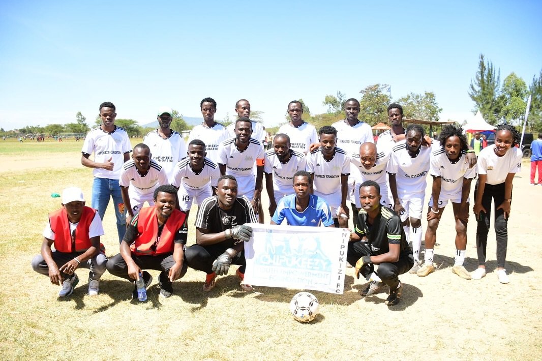 Chipukizi Football Club team members on the field